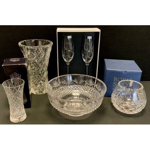 178 - A Stuart crystal glass bowl;  vase;  pair of Royal Doulton crystal Many Happy Returns toasting flute... 