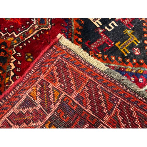 332 - A South West Persian Lori tug / carpet, hand-knotted with central row of three diamond-shaped medall... 