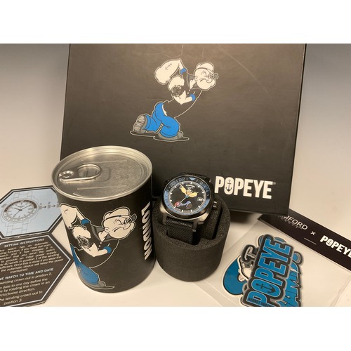 1007 - Bamford London - a Popeye GMT limited edition wristwatch, two tone black and blue dial with Popeye d... 