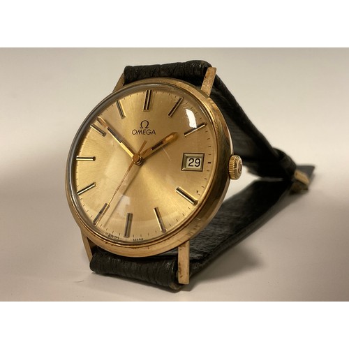 1160 - A 9ct gold gentleman's Omega wristwatch, gilt dial, block baton markers, centre seconds, manual stem... 