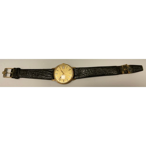 1160 - A 9ct gold gentleman's Omega wristwatch, gilt dial, block baton markers, centre seconds, manual stem... 