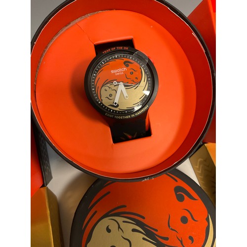 1063 - Swatch - two Tiger Power SB03Z102 wristwatches, each with gold tigers head bio ceramic dial, within ... 