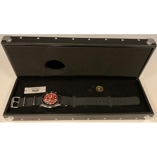 1071 - Seiko - a Brian May Sport five limited edition steel cased automatic wristwatch, 5873/9000, red spec... 