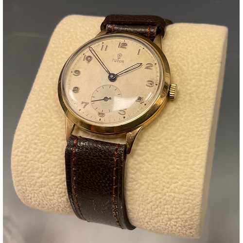 1074 - Rolex Tudor - 1950s 9ct gold cased wristwatch, textured dial, raised Arabic Numerals, mechanical 15 ... 