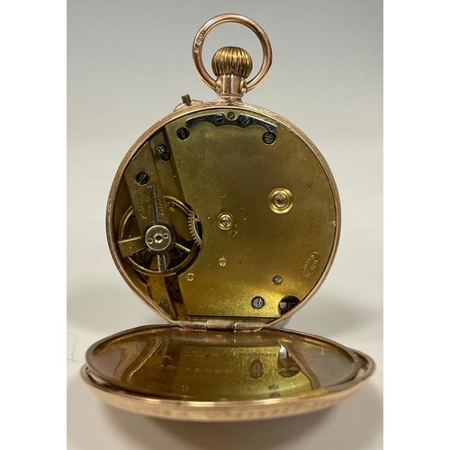 1180 - A Swiss 9ct gold cased open face pocket watch, ornate gilt dial, Roman numerals, stem wind Swiss mov... 