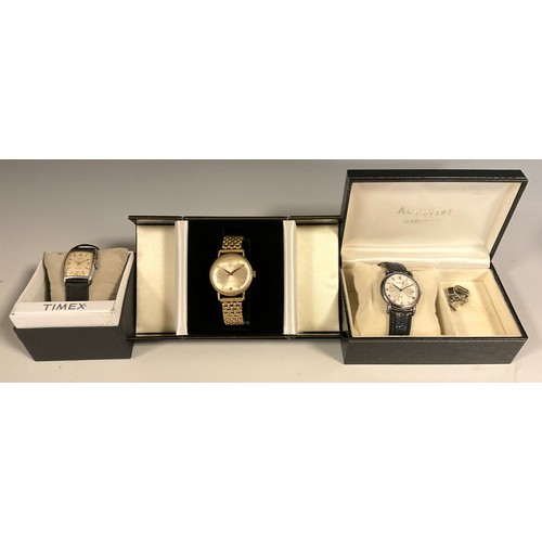 1148 - Watches - Accurist silver cased wristwatch, silver dial, Roman numerals, centre seconds, date apertu... 