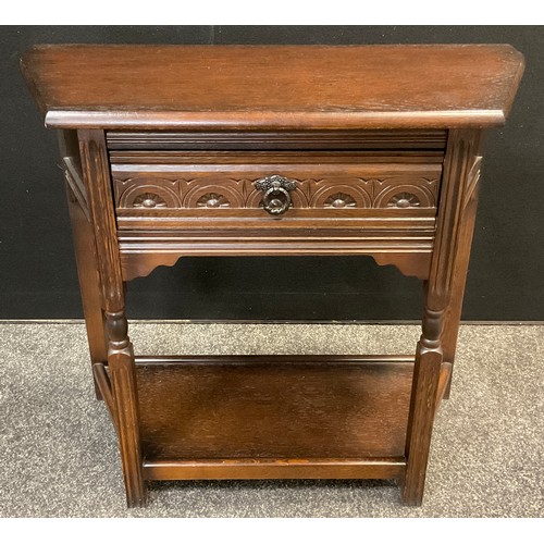 400 - An Old Charm style oak hall table, canted rectangular top, single drawer to frieze, shelf to base, 7... 