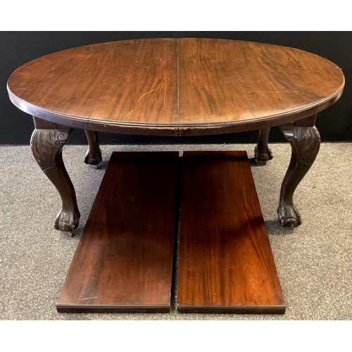 474 - A Victorian mahogany oval extending dining table, large carved cabriole legs, ball and claw feet, ce... 