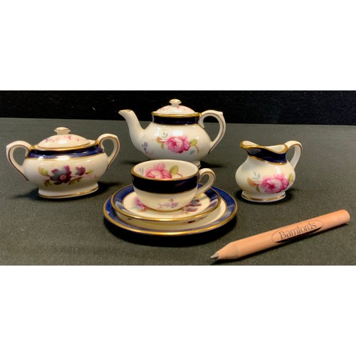 499 - A Coalport Miniature Pink Rose pattern bachelor tea set, comprising teapot, sugar bowl, milk jug, cu... 