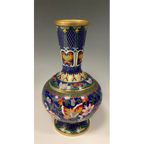 35A - A Chinese Cloisonné vase, decorated with butterflies and flowers in red, orange, green, and turquois... 