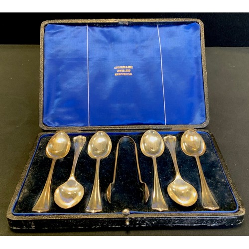 549 - A set of six silver tea spoons, conforming sugar tongues, Sheffield,1915, boxed