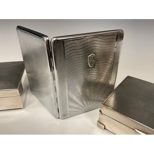 558 - A silver cigarette box; another smaller; a Polski Tank Corps cigarette case, inscribed 'POLSKI 2 KOR... 