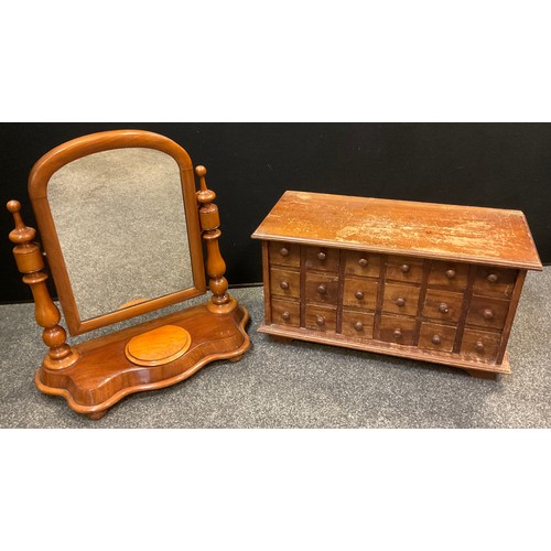 409 - A 20th century table-top Apothecary or Spice chest, the walnut chest having an over-sailing rectangu... 