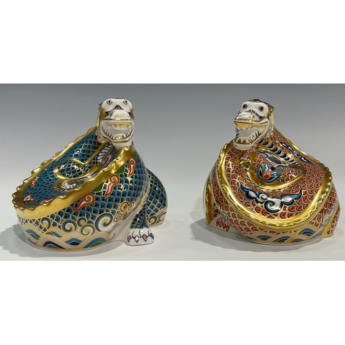 8 - A pair of Royal Crown Derby paperweights, Millennium Dragons, Dragon of Happiness and Dragon of Good... 