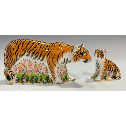 10 - A pair of Royal Crown Derby paperweights, Sumatran Tigress and Sumatran Tiger Cub, gold stoppers, ea... 