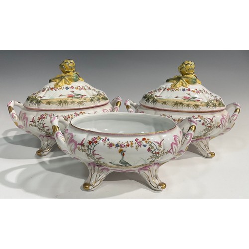 15 - A pair of porcelain fluted oval tureens and covers decorated in polychrome with birds and flowers, p... 