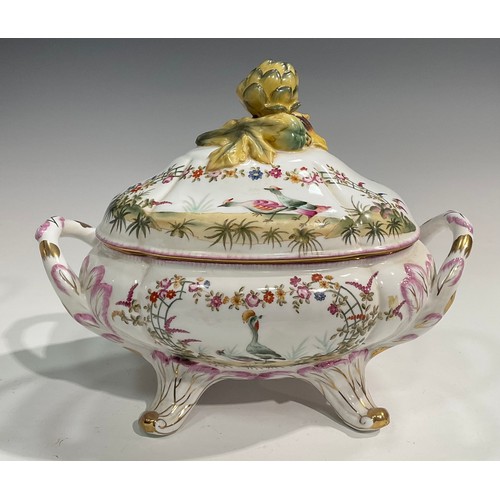 15 - A pair of porcelain fluted oval tureens and covers decorated in polychrome with birds and flowers, p... 