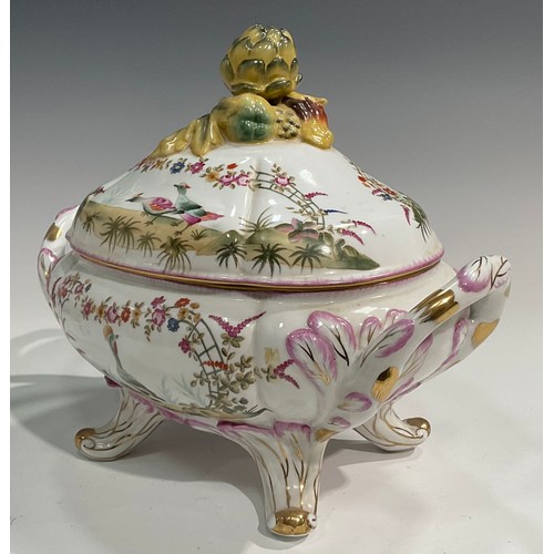 15 - A pair of porcelain fluted oval tureens and covers decorated in polychrome with birds and flowers, p... 