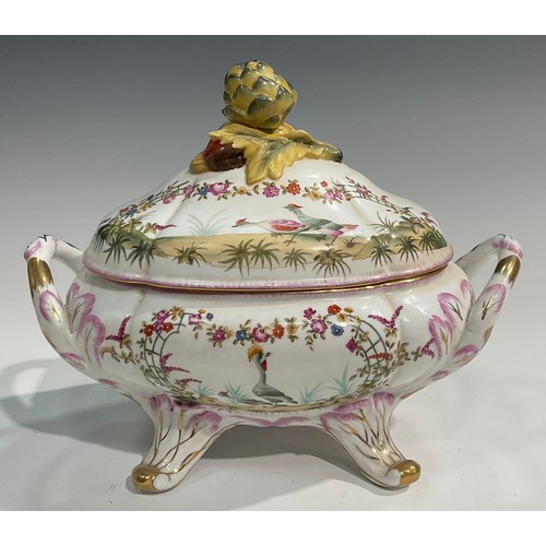 15 - A pair of porcelain fluted oval tureens and covers decorated in polychrome with birds and flowers, p... 