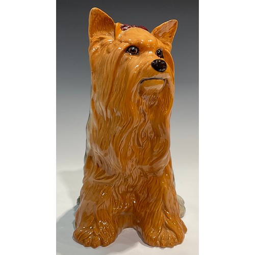 28 - A Beswick fireside model, of a Yorkshire Terrier, seated with ribbon, 26cm high, impressed mark, mod... 