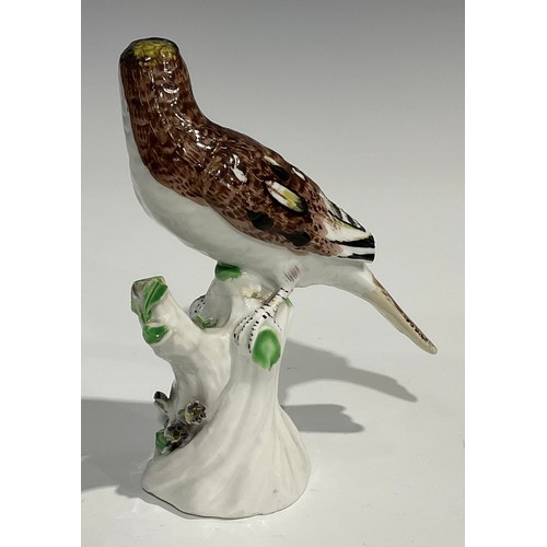 60 - A Berlin porcelain model, of a swan, swimming with wings outstretched, the feathers picked out in mo... 