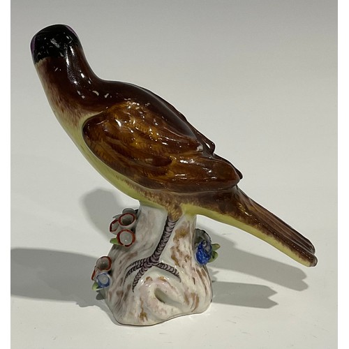 60 - A Berlin porcelain model, of a swan, swimming with wings outstretched, the feathers picked out in mo... 