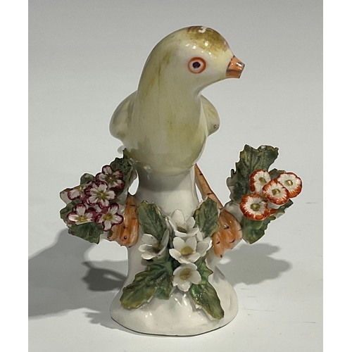 60 - A Berlin porcelain model, of a swan, swimming with wings outstretched, the feathers picked out in mo... 