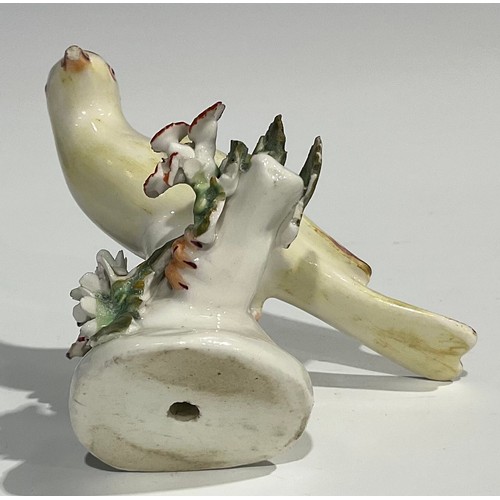 60 - A Berlin porcelain model, of a swan, swimming with wings outstretched, the feathers picked out in mo... 