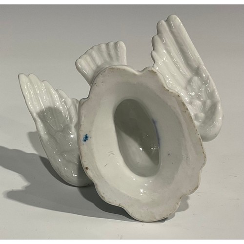 60 - A Berlin porcelain model, of a swan, swimming with wings outstretched, the feathers picked out in mo... 