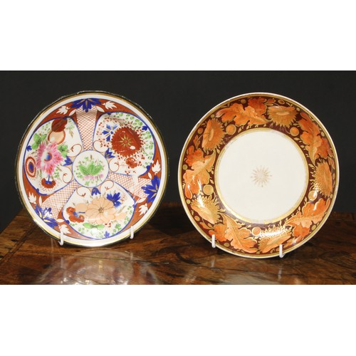 66 - A Pinxton circular plate, pattern number 342, decorated in the Imari palette with panels of stylised... 