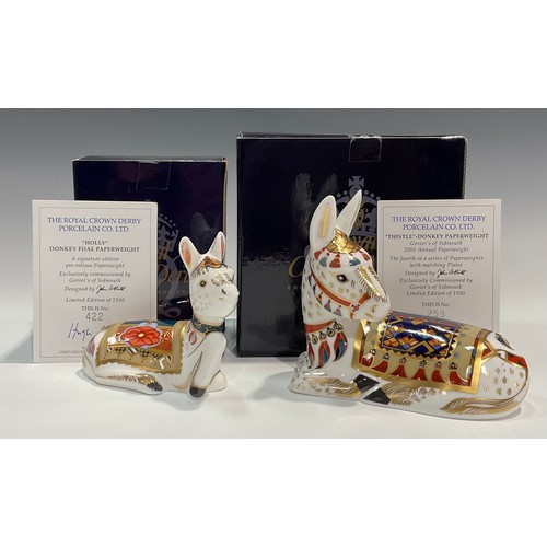 87 - An associated pair of Royal Crown Derby paperweights, Thistle Donkey, Govier's exclusive 2001 annual... 