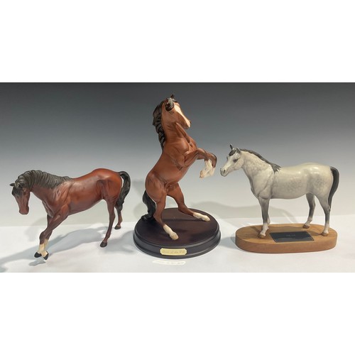 88 - A Beswick model, of a rearing horse, Spirit of the Wild, circular wooden base, matte glaze, 30cm hig... 