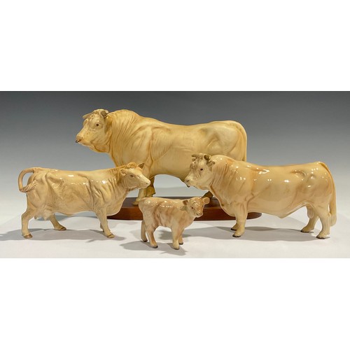 96 - A set of three Beswick Charolais cattle, bull, cow and calf; a Beswick model of a Charolais Bull, ma... 