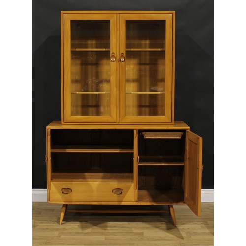 101 - An Ercol display cabinet, 173cm high, 114.5cm wide, 44cm deep