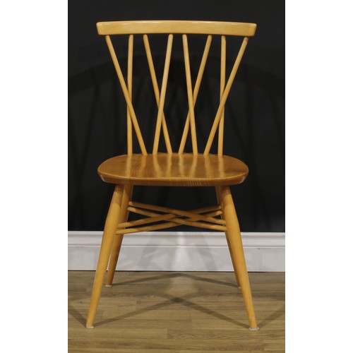 102 - A set of four Ercol candlestick dining chairs, 79cm high, 46cm wide, the seat 41.5cm wide and 34cm d... 