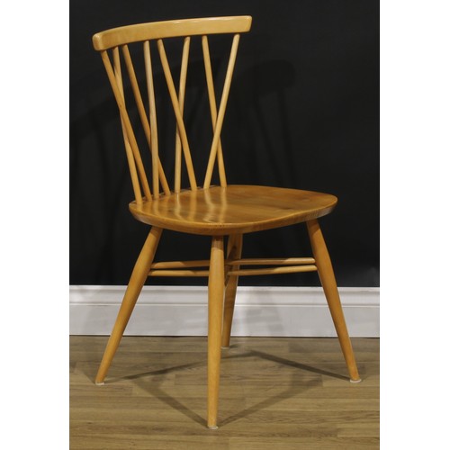 102 - A set of four Ercol candlestick dining chairs, 79cm high, 46cm wide, the seat 41.5cm wide and 34cm d... 