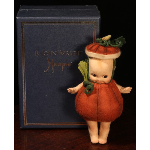 6104 - An R.John Wright miniature Kewpie Pumpkin felt doll, cardboard tag to reverse, 18cm high, boxed, No.... 