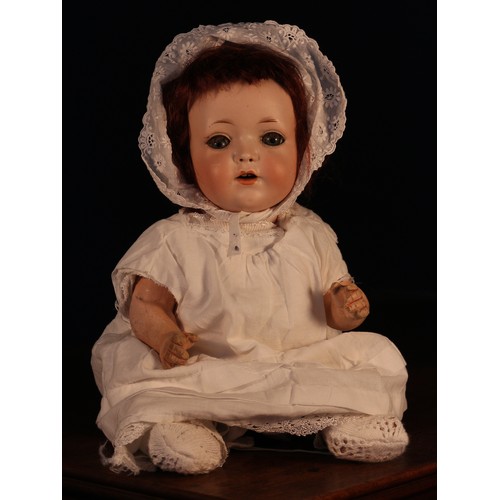 6122 - An Edmund Edelmann (Germany) bisque head and painted composition bodied doll, the bisque head with w... 