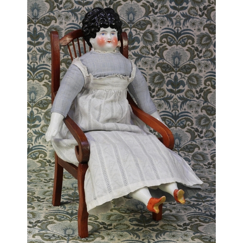 6137 - A 19th century glazed china shoulder head doll, probably German, the glazed head with black moulded ... 