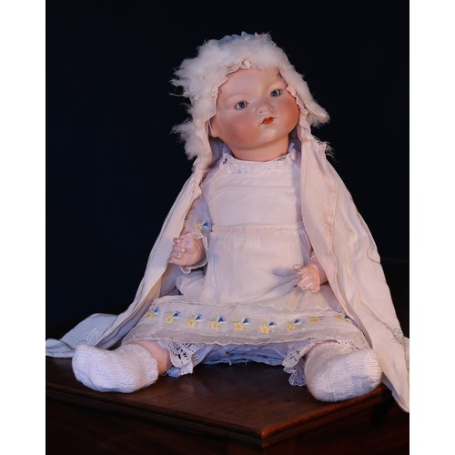 6143 - An Armand & Marseille (Germany) bisque head and painted composition bodied 'Dream' baby doll, the bi... 