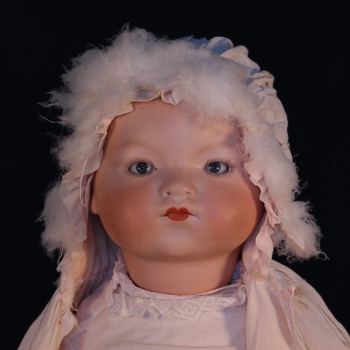 6143 - An Armand & Marseille (Germany) bisque head and painted composition bodied 'Dream' baby doll, the bi... 