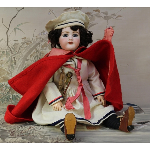 6152 - An L.Prieur (France) Mon Cheri bisque head and painted composition ball jointed bodied doll, the bis... 