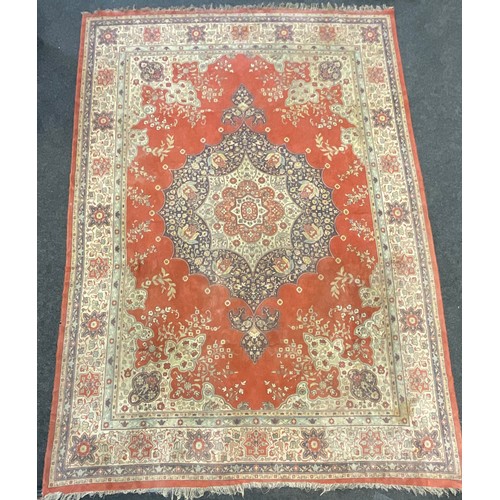 83 - A Middle Eastern wool and Silk mix carpet / rug, large central medallion in blue and cream within a ... 