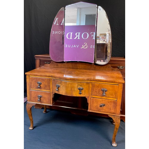 97 - An Edwardian mahogany sideboard, pair of drawers to frieze, above two large cupboard doors, 87cm hig... 