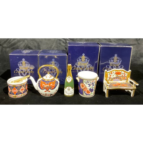 6 - A Royal Crown Derby miniature champagne bottle and ice bucket, first quality, boxed; others, drum wi... 