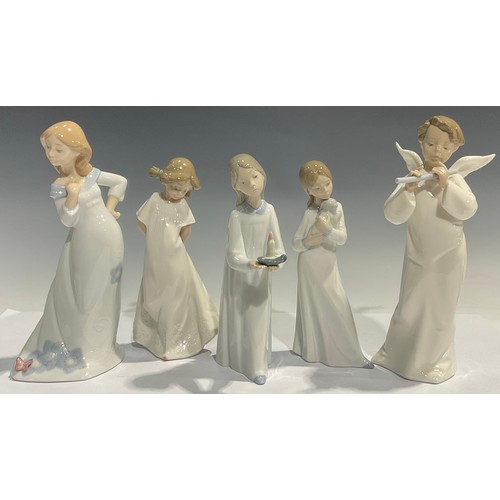 14 - A Nao Lladro figure of a young girl holding a puppy, 20cm high; a Nao Llado figure of a young girl w... 