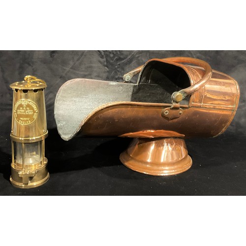 56 - A brass miner's lamp, Eccles, Protector Lamp, swing handle; a copper coal scuttle, swing handle (2)