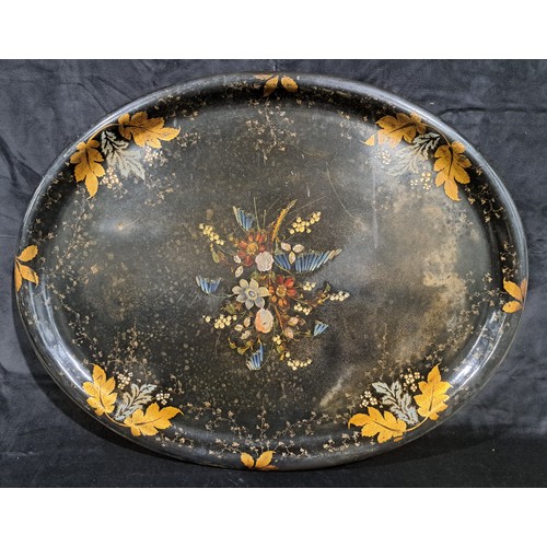 58 - A large Victorian oval papier-mâché tray, decorated with flowers and mother of pearl inlay, 76cm wid... 