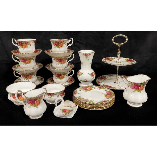 81 - A Royal Albert Old Country Roses pattern part tea service; others, vase, clock, etc