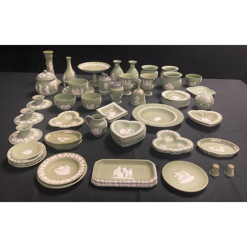 86 - A quantity of Wedgwood green jasperware including vases, preserve jar and cover, comport, candlestic... 